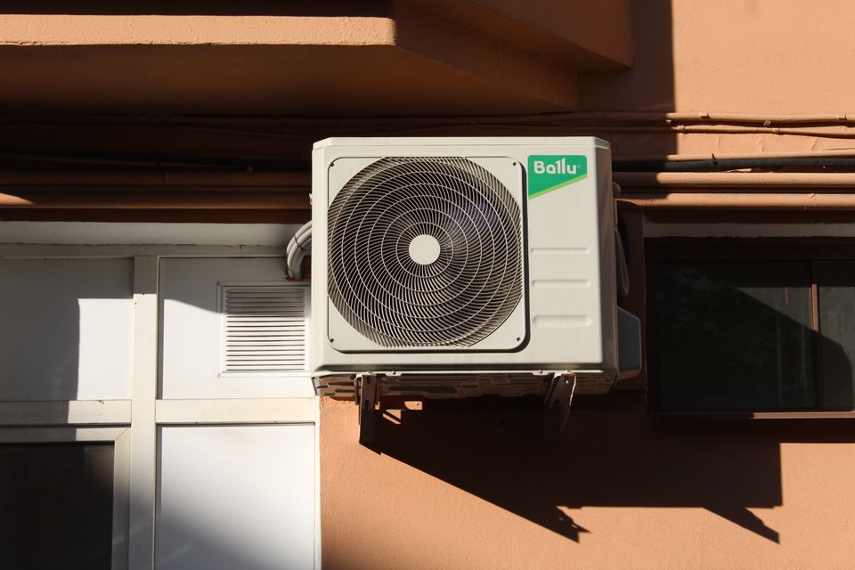 A newly mounted outdoor air conditioning condenser unit